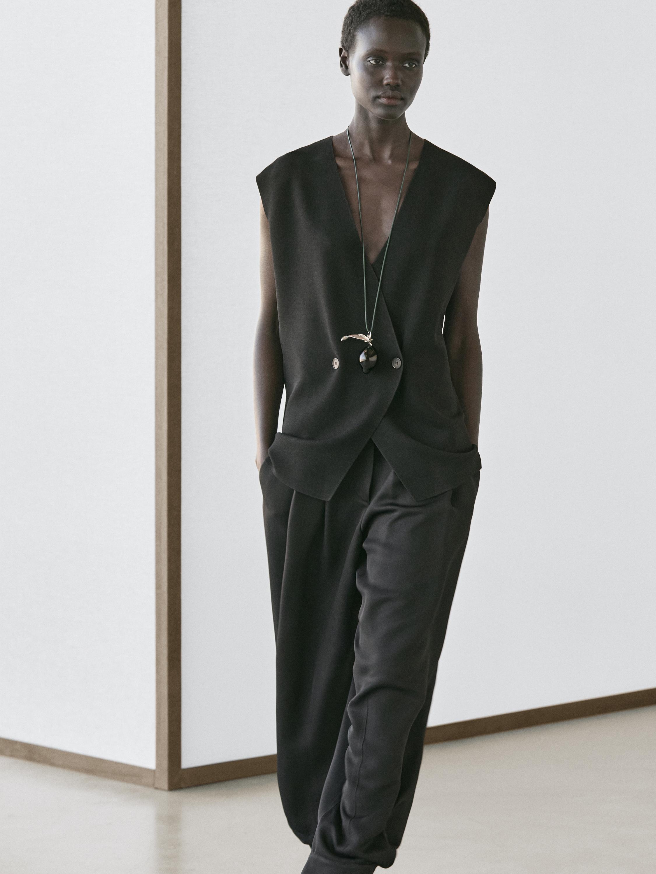 Long double-breasted vest